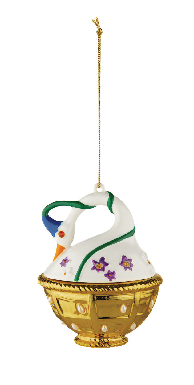 Alessi Cigno di primavera, hangend zwaan-ornament in wit porselein met gouden mand