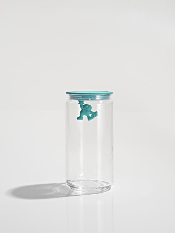 Alessi Gianni voorraadpot van glas met deksel en klein man-figuur in turquoise, ontwerp Mattia Di Rosa