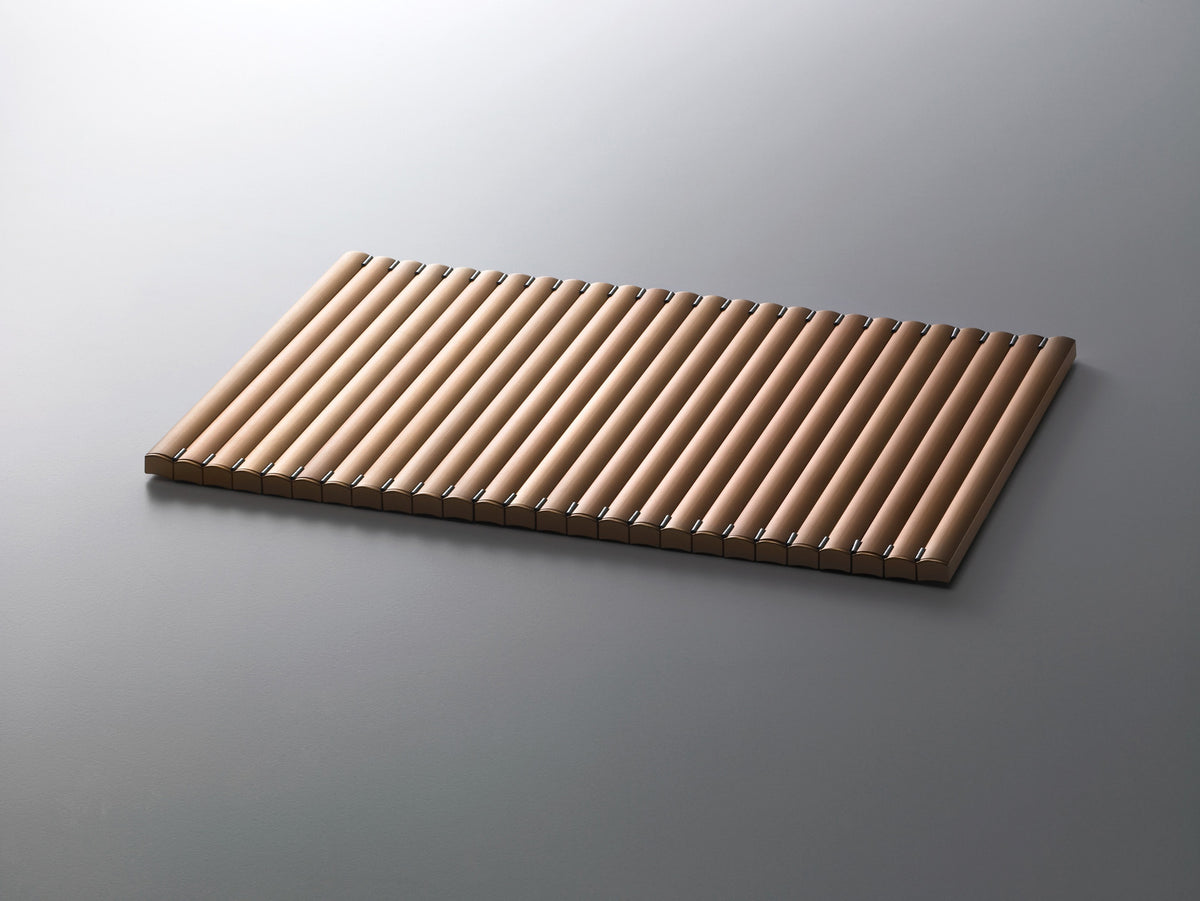 Alessi Jane dienblad in geanodiseerd aluminium, koperkleurig, opgerolde latjesstructuur