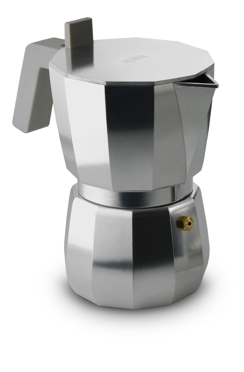 Alessi Moka espresso maker, 6-cup, aluminium, octagonal shape, shown in use from angled corner