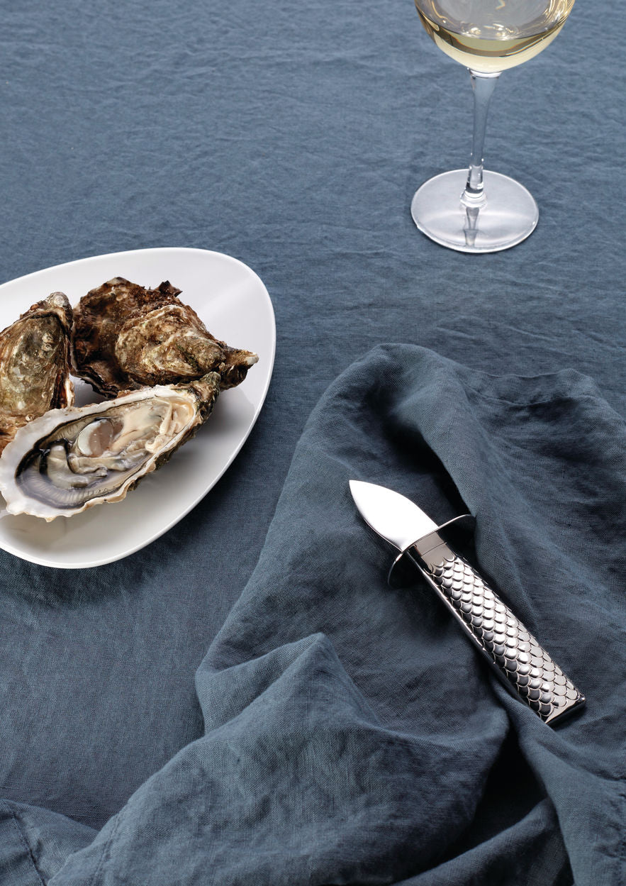 Colombina oestermes uit de serie Colombina Fish, bij geopende oesters
