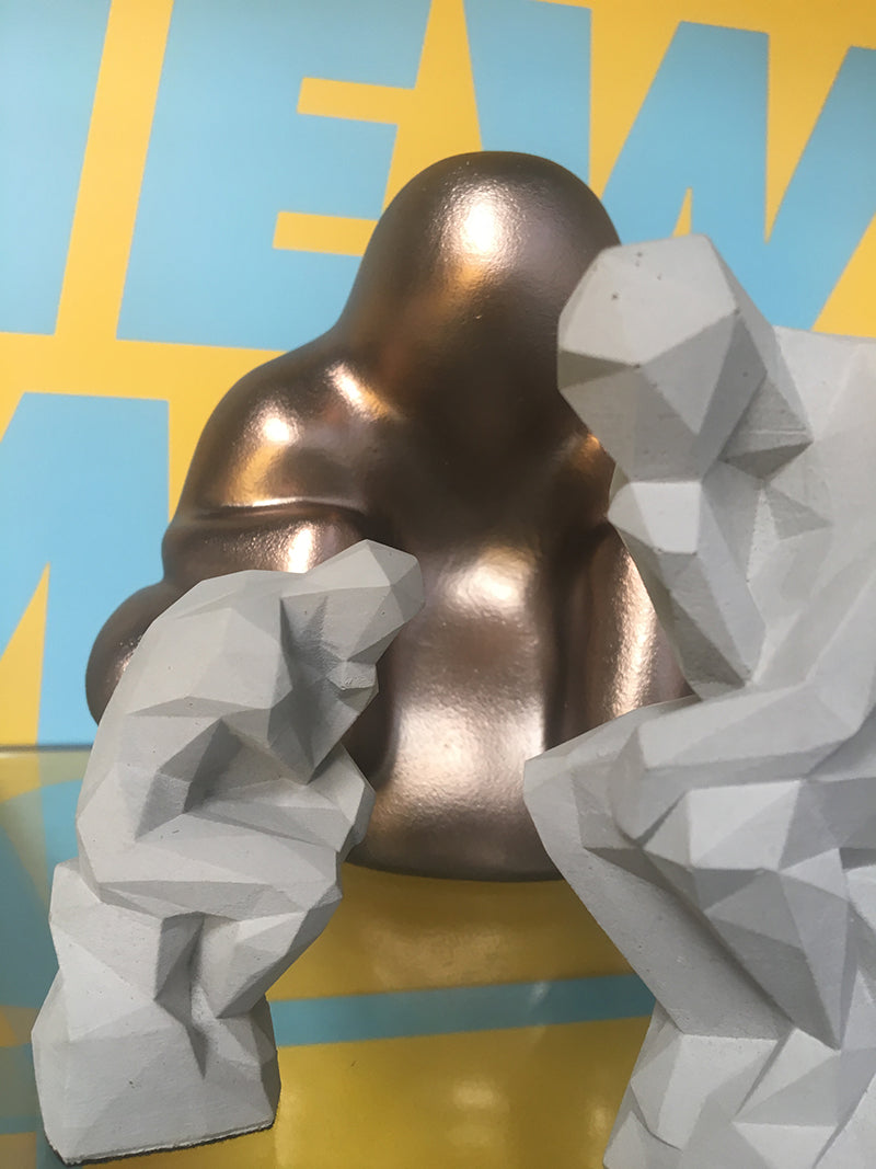 Alessi Big Mindset beeldje eindhoven in brons naast exemplaren in grijs