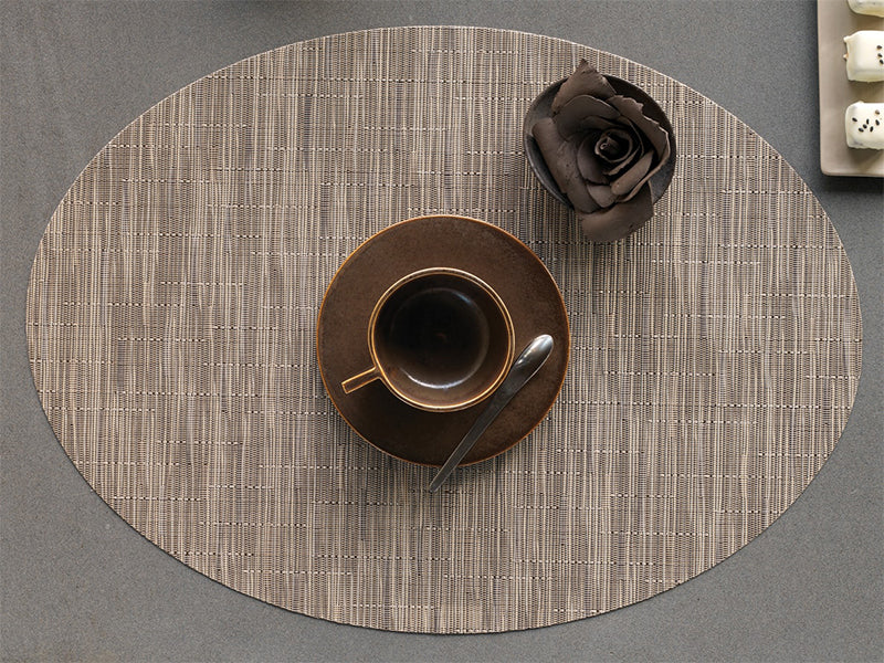 Chilewich ovale placemat Dune Bamboo in use with cup and saucer