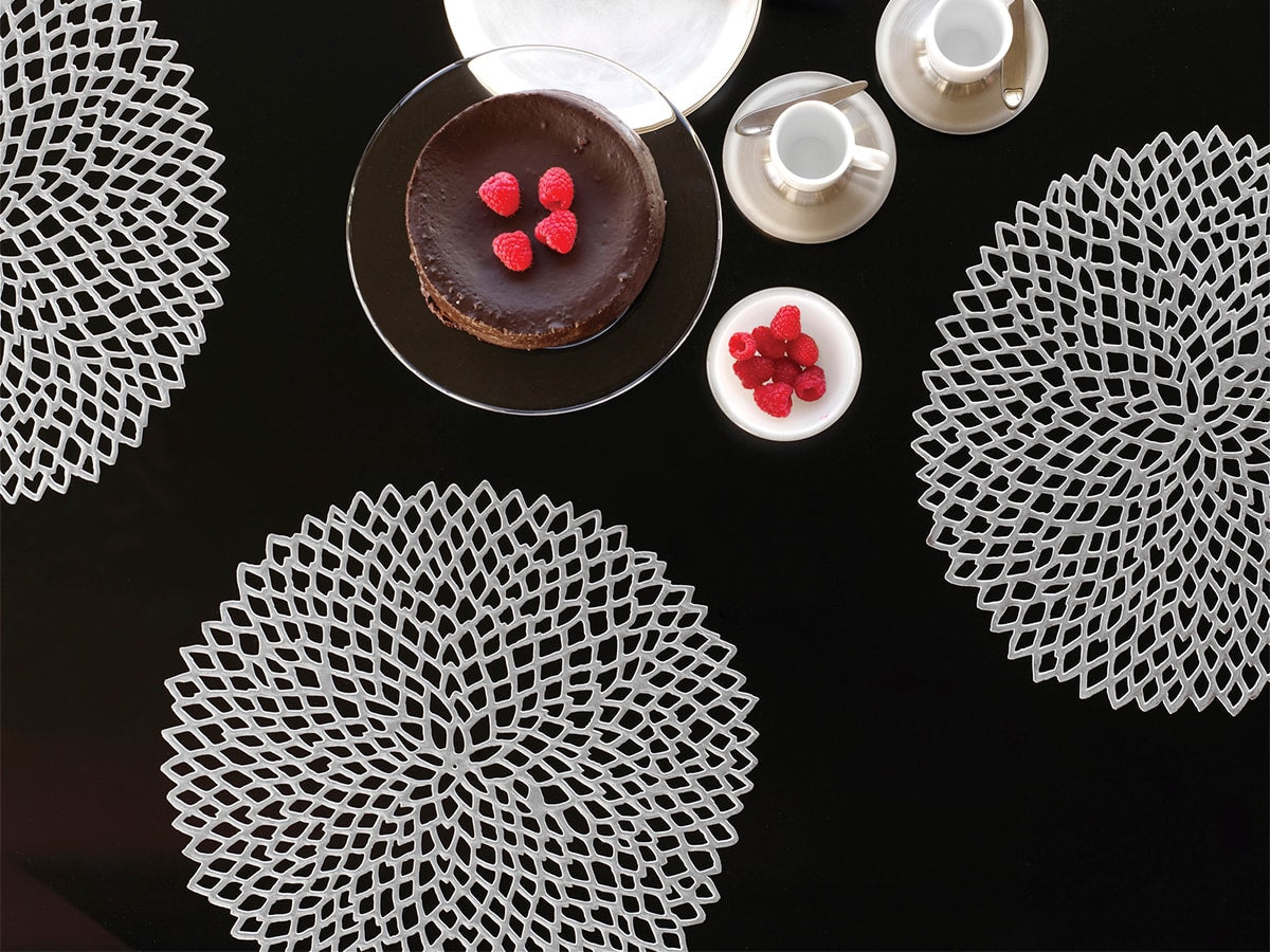 Multiple Dahlia placemats on table, beautiful combined with tableware