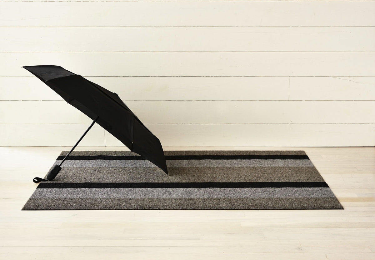 Chilewich Bold Stripe doormat in silver and black, 46 x 71 cm