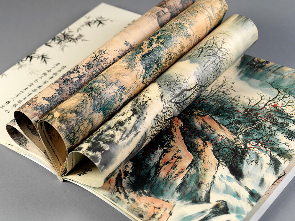 Chinese Art geschenkpapier, detail van gevouwen vellen met berglandschap