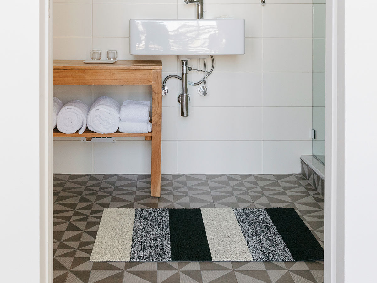 Deurmat met drie brede banen, detail van het gemêleerde middenvlak.