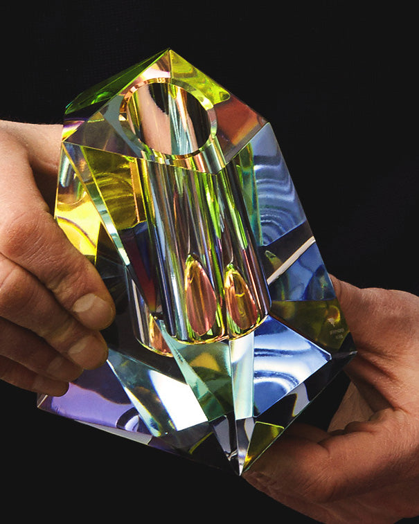 Detail of faceted crystal Regenbogen vase, held in hand