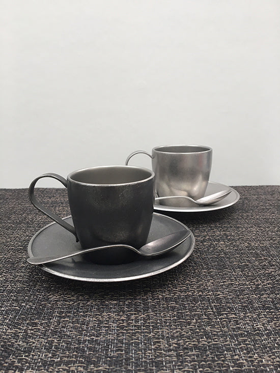 Aoyoshi Baguette coffee cup and saucer, Vintage in black and polished steel side by side