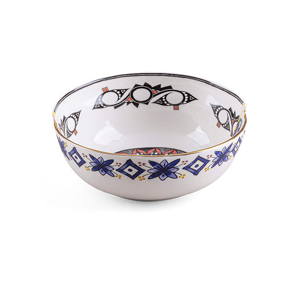 Bowl from the Hybrid World series by Seletti, designed by CTRLZAK, with blue floral motif and eye decor