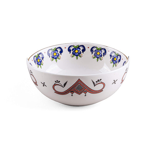 Bowl with blue floral motif inside, red-black geometric decoration outside