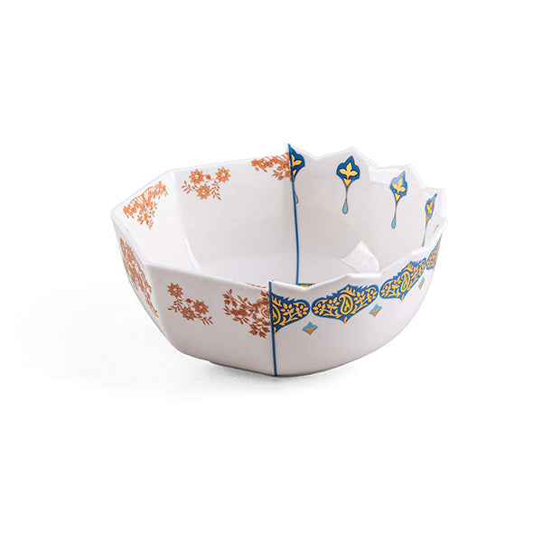 Bowl by Seletti, design CTRLZAK, three-quarter view with blue-yellow decoration