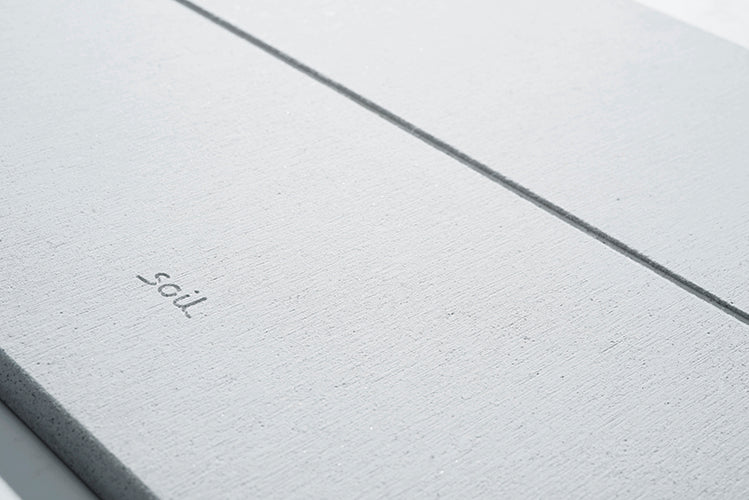 Soil Japanese bath mat, detail of beautiful texture with logo