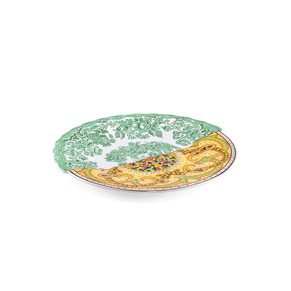 Seletti Sravasti dessert plate from the Hybrid-World series, design CTRLZAK, side view with green and yellow pattern