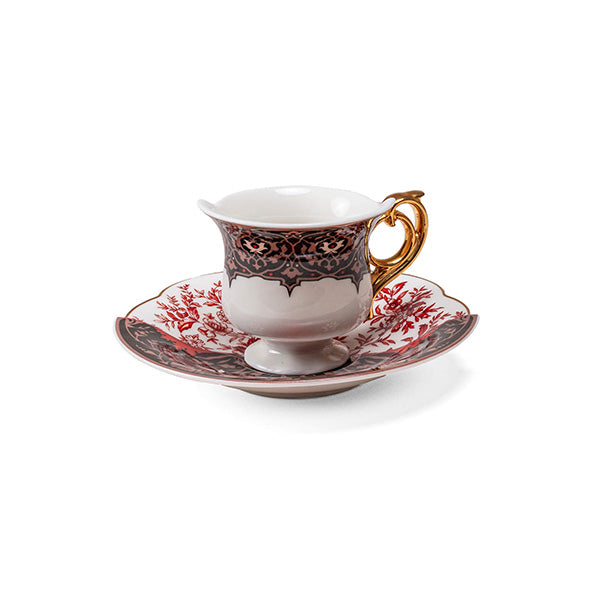 Seletti coffee cup and saucer, Sagala, side view with gold-coloured handle on right