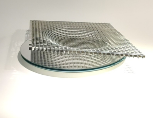 Rvs Gravity fruitschaal van Fundamental, ontworpen door Rönsch-Molloy, op glazen voet.
