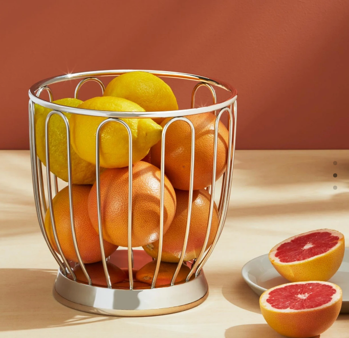 Alessi Citrus Basket fruitkorf, gevuld met citroenen en grapefruits, roestvrij staal