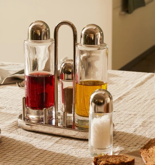 Alessi menage set voor olie, azijn, peper en zout, gevuld, van Ettore Sottsass