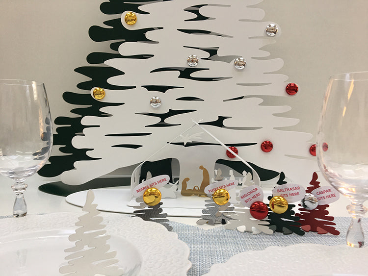 New Mini Bark little trees by Alessi in three colours: white, black and red, with gold and silver knob