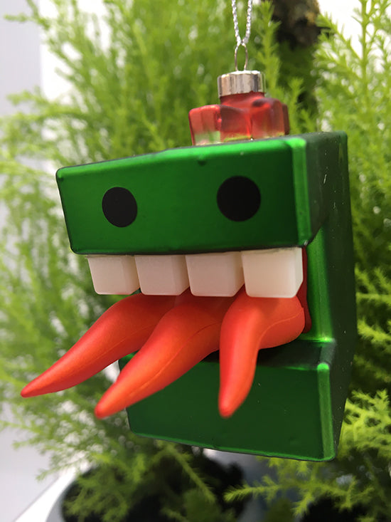 Cubodrago kerstkubus van Alessi, kerstbal in glas als vuurspugend draakje, close-up van de bek.
