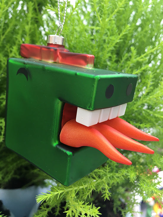 Cubodrago Christmas cube by Alessi, glass Christmas bauble shaped as little dragon, side view