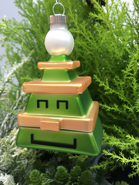 Alessi Cubic-Tree kerstbal in boomvorm, groen met gouden banden, close-up
