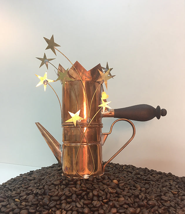 Napolitan Coffee 100 Years koffiezetter van Alessi met verlichte sterdecoratie