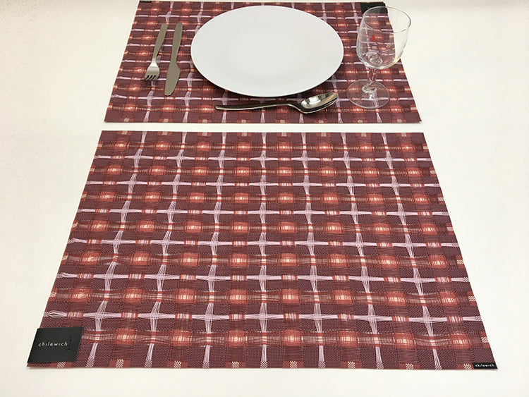 Chilewich placemat Hopscotch Sangria, last set, styled with plate and glass