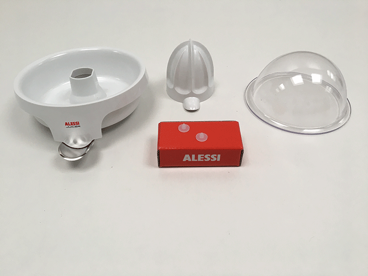 Onderdelen voor Alessi elektrische citruspers: bassin, perskegel, deksel en rubbertje