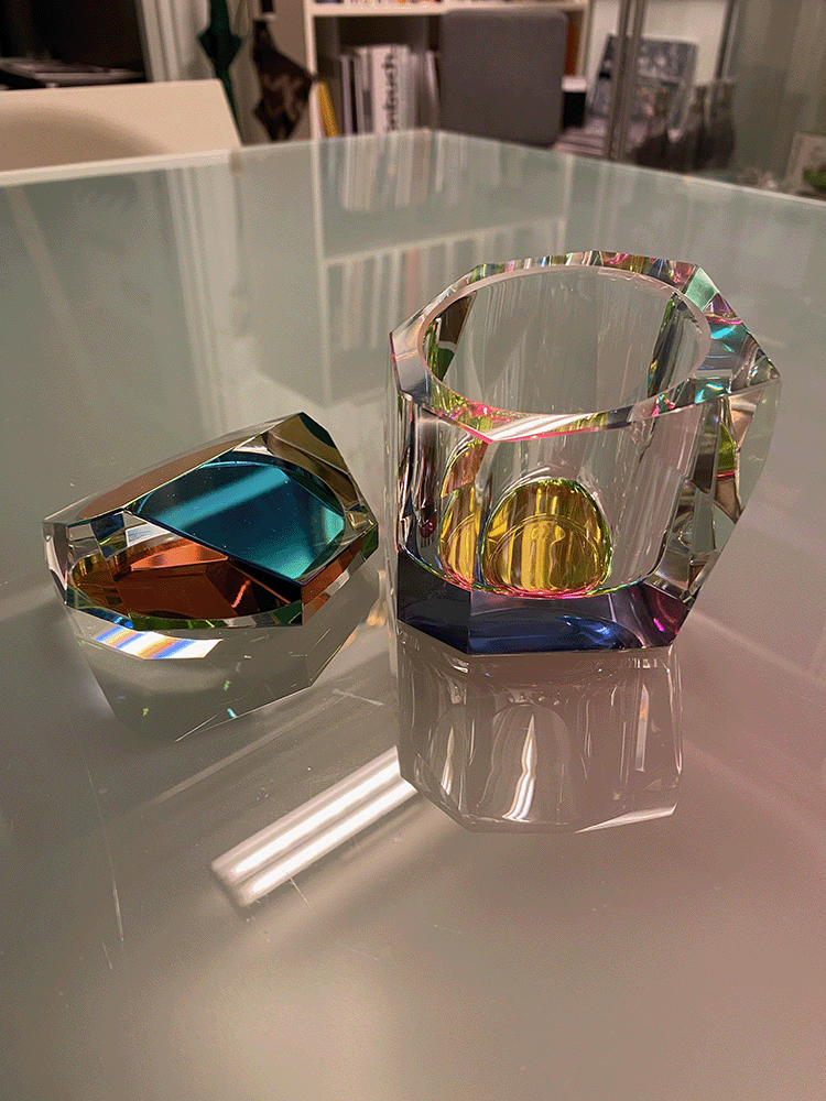 Two Regenbogen storage boxes by Fundamental side by side, open and closed