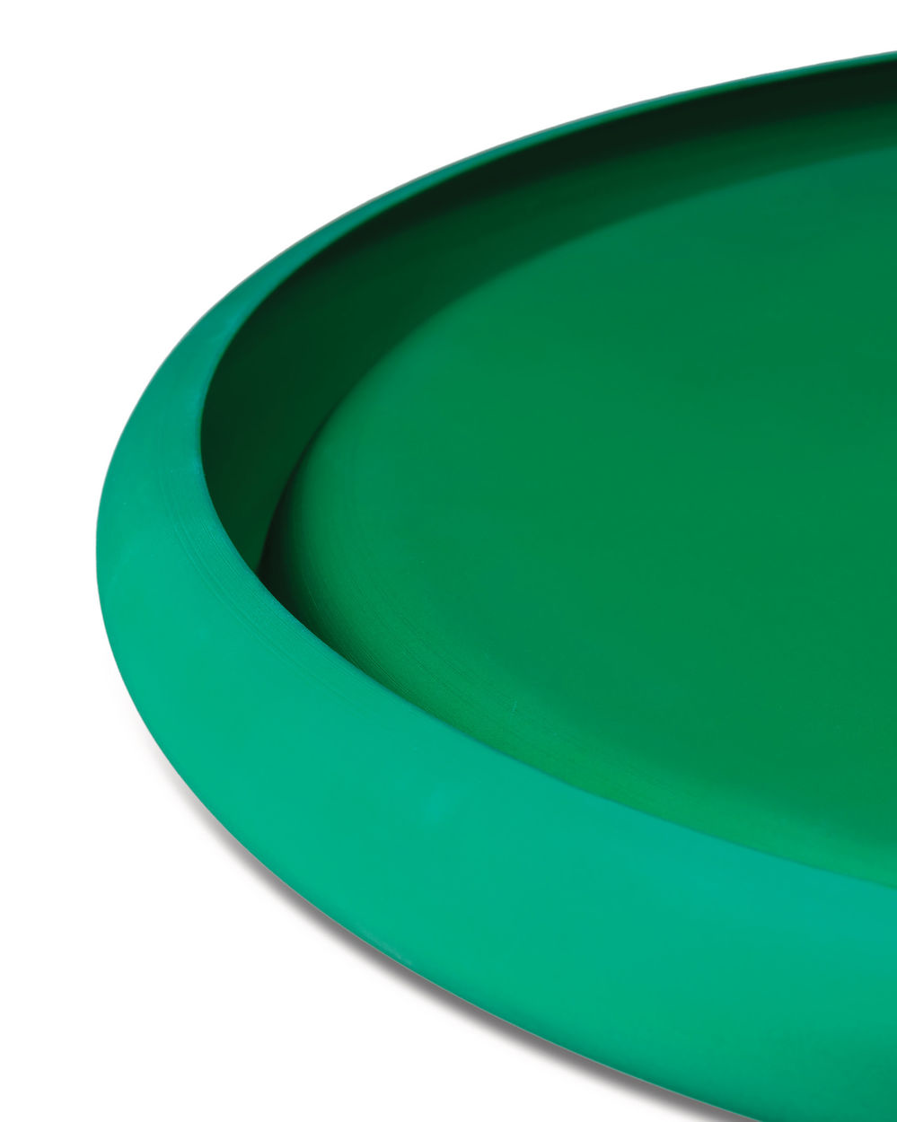 Detail van de rand van het Discolo dienblad in groen