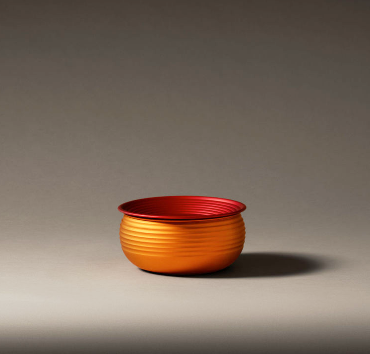 Alessi Ondine kom, oranje met rode binnenzijde, ontwerp Pierre Charpin