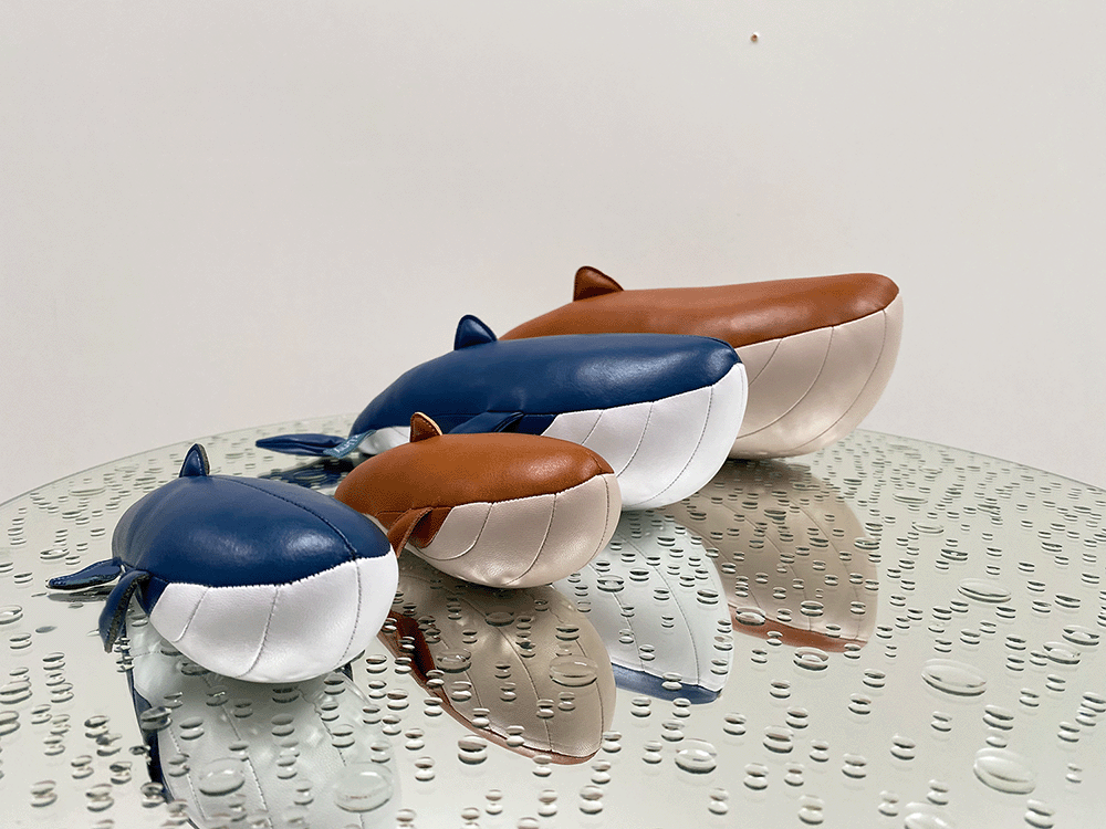 Groep Zuny Whale Wave presse-papiers in bruin en blauw, diverse formaten