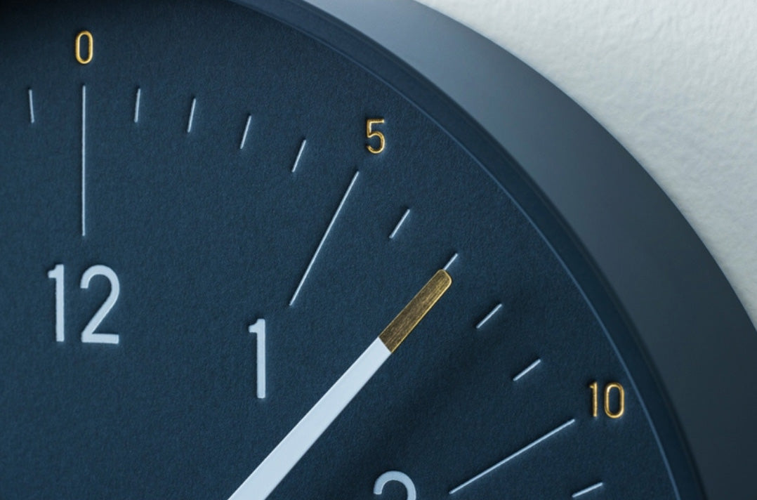 Essence Dark Navy clock dial detail with embossed numerals