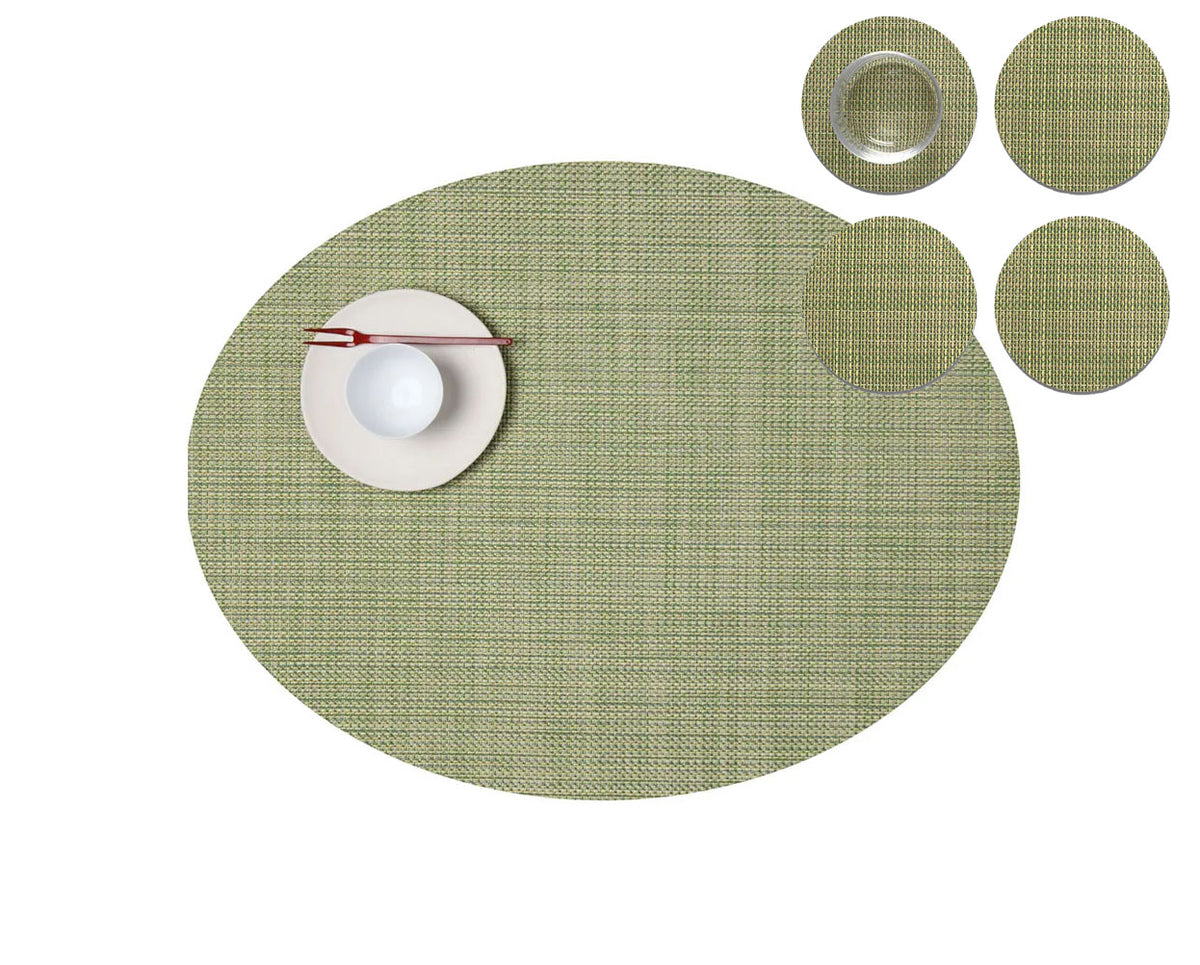 Chilewich Dill coasters next to ovale placemat from the same Mini Basketweave series