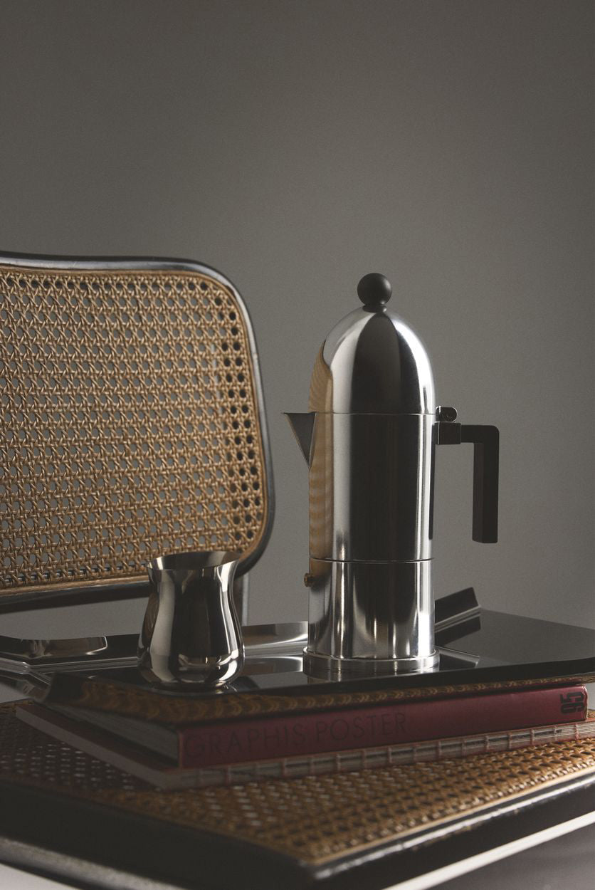 Cupola coffee maker by Alessi, side view with black handle and base ring
