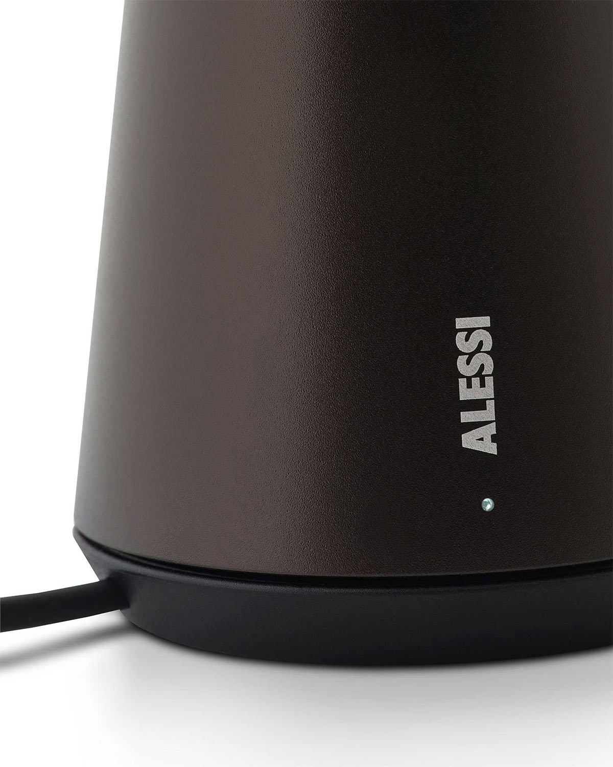 Detail of cup and Alessi logo on the Bedin lamp in brown