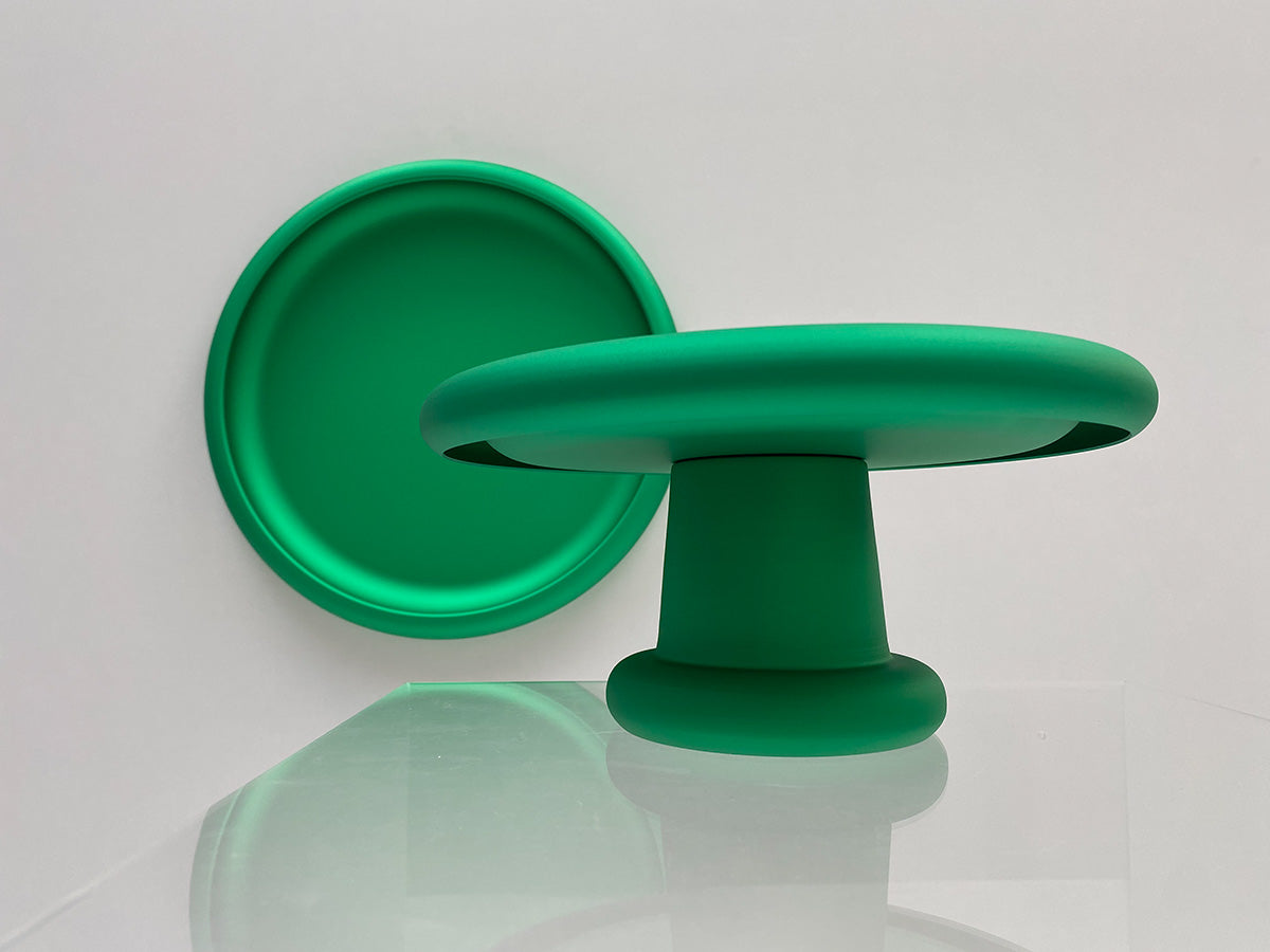 Discolo cakestand in groen, schuin aanzicht met zicht op onderkant
