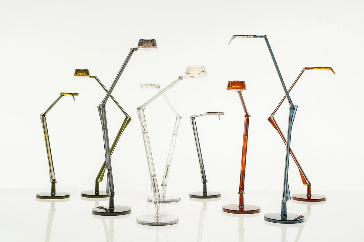 Aledin desk lamps in various colours, including amber, side by side
