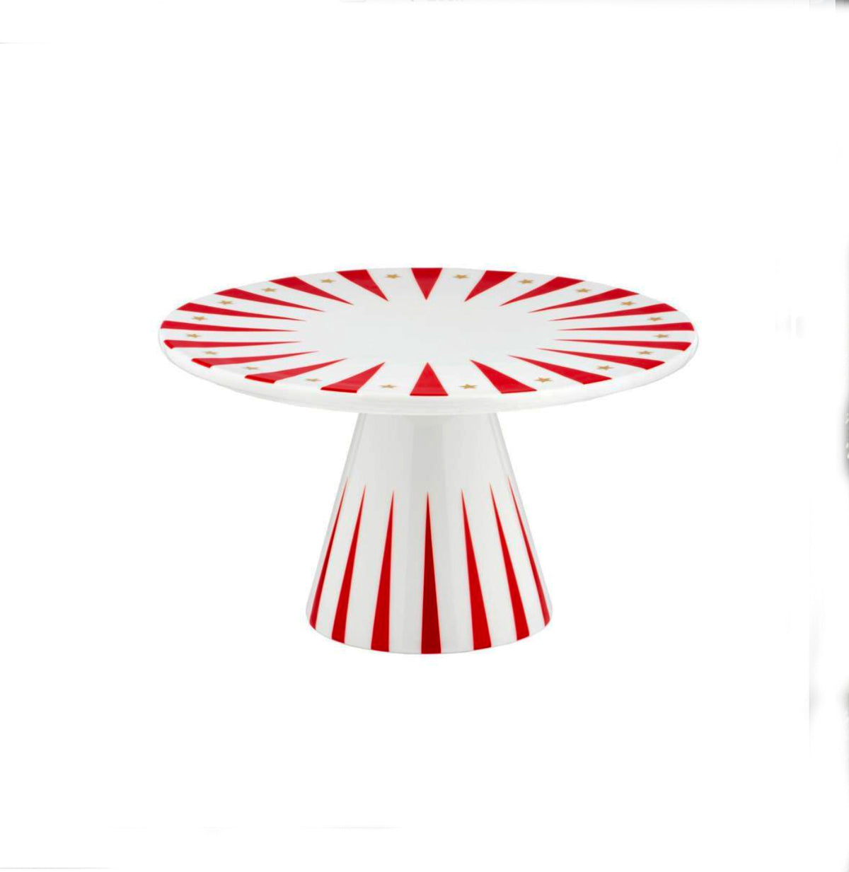 Keramische taartplateau van Alessi, wit met rood sterrenmotief, vrijstaand.