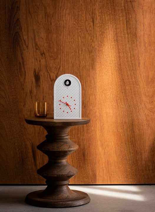Lemnos Coo White cuckoo clock, detail of bird and dial in arched housing