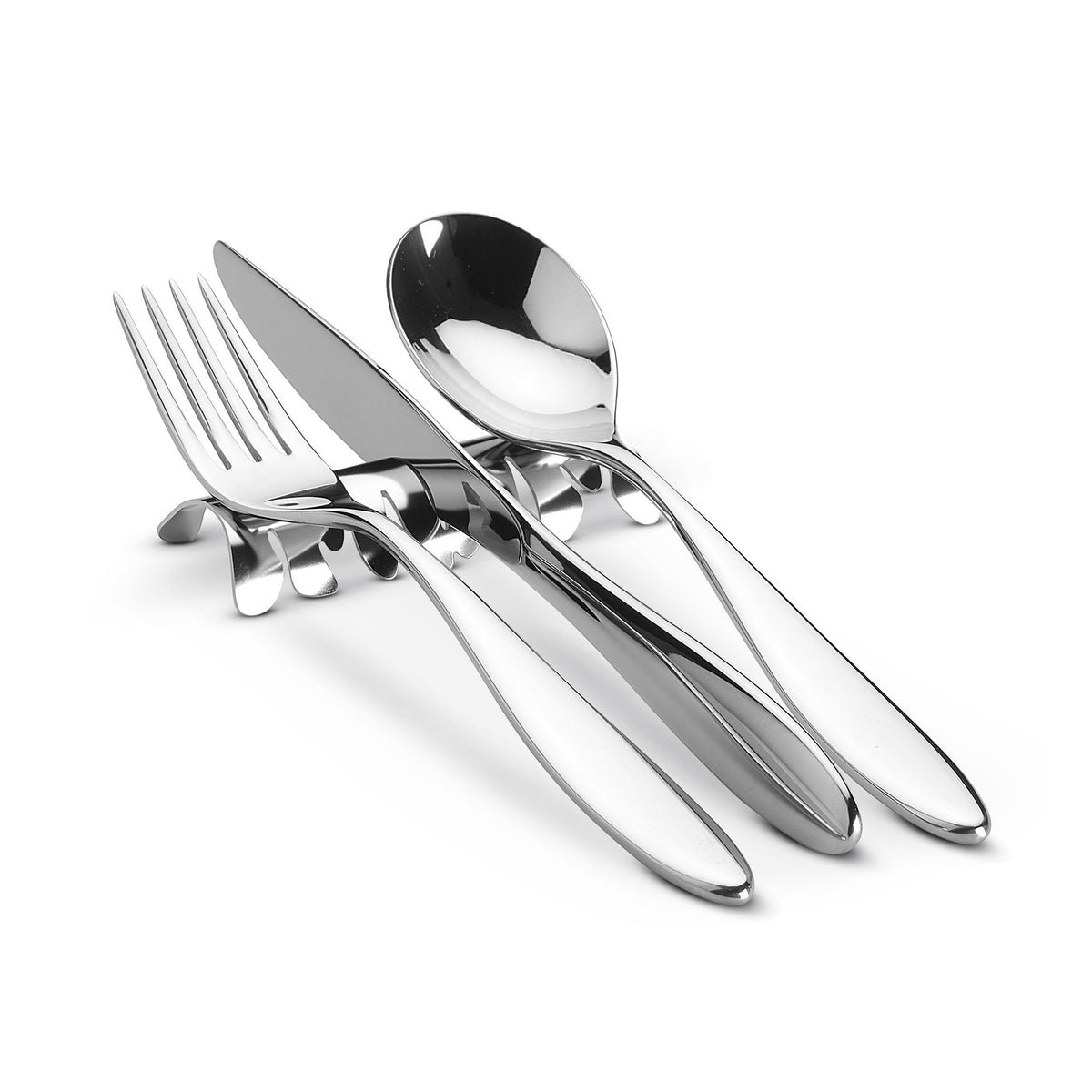 Messenlegger Barkrest van Alessi met mes, vork en lepel erop geplaatst
