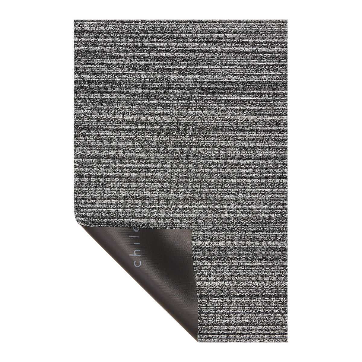 Hoek en rand van de Chilewich deurmat Skinny Stripe Shadow