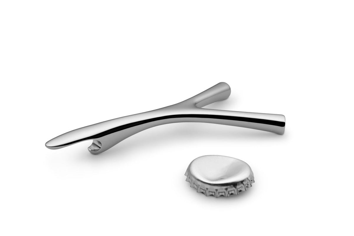 Alessi Virgula Divina bottle opener in stainless steel, with spare bottle cap