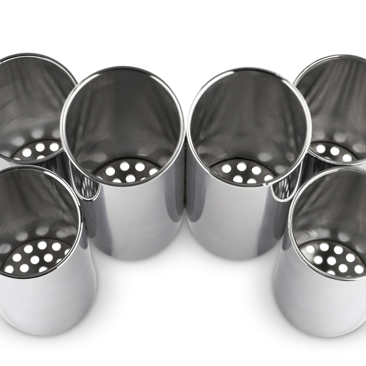 Alessi Canale bestekhouder, ontwerp Patricia Urquiola, zes cilindervormige vakken op tafel