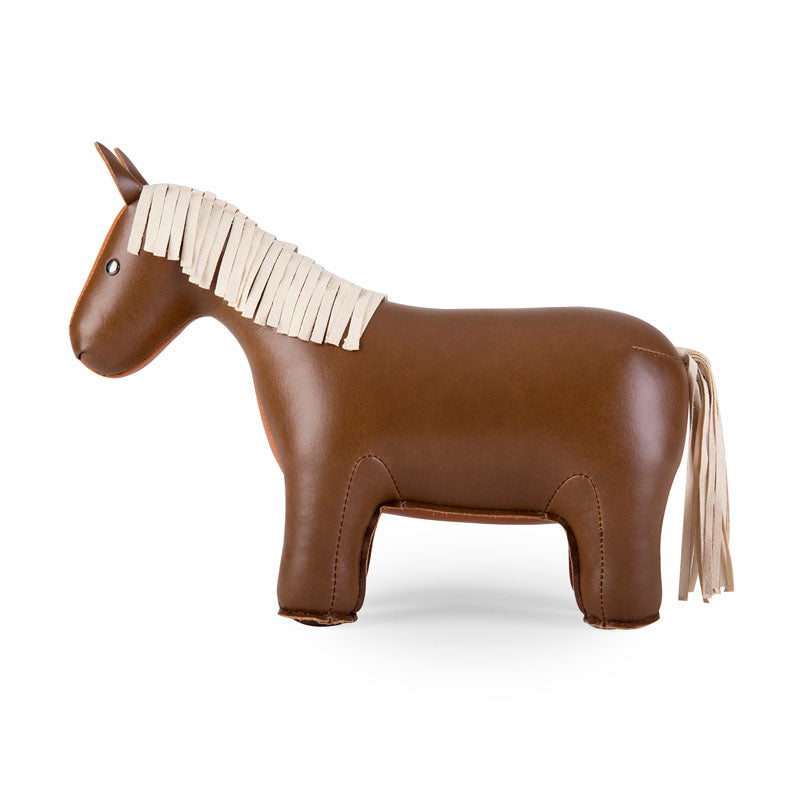 Bruin paard van kunstleder, zijaanzicht met staart en manen in beige