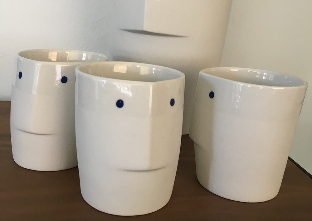 Alessi Facecup mug set, 3 white porcelain mugs with face motif, design Ines de Booij