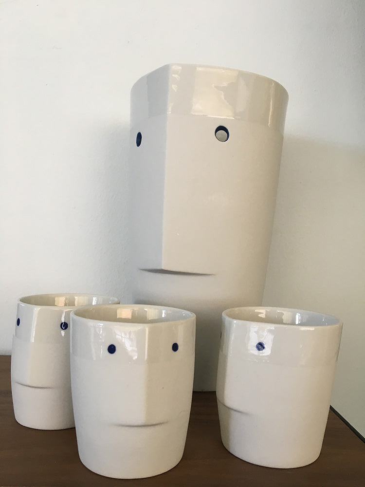 Alessi Facecup cup set with matching vase, white porcelain with face motif