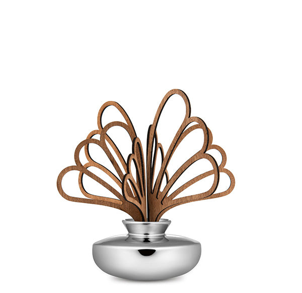 Alessi Uhhh scented leaves in wood, placed on the fragrance diffuser