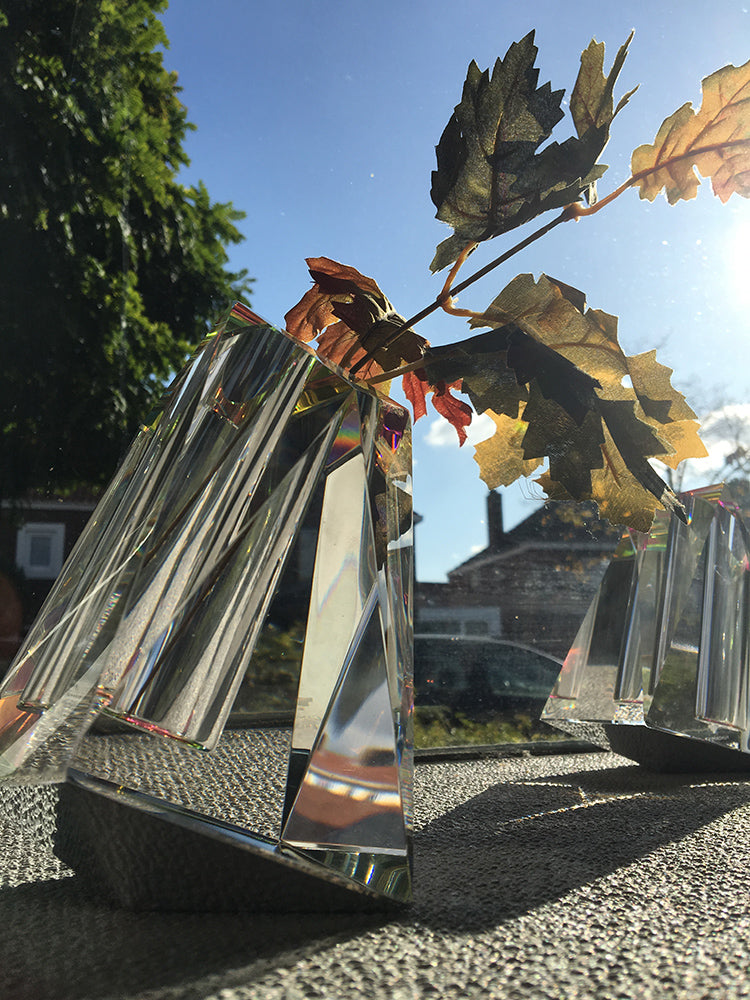 Regenbogen crystal vase by Fundamental with autumn leaf, outdoor shot